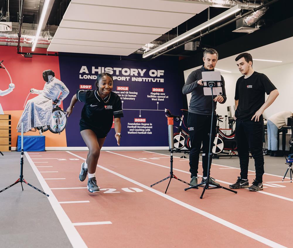 Student training on indoor track