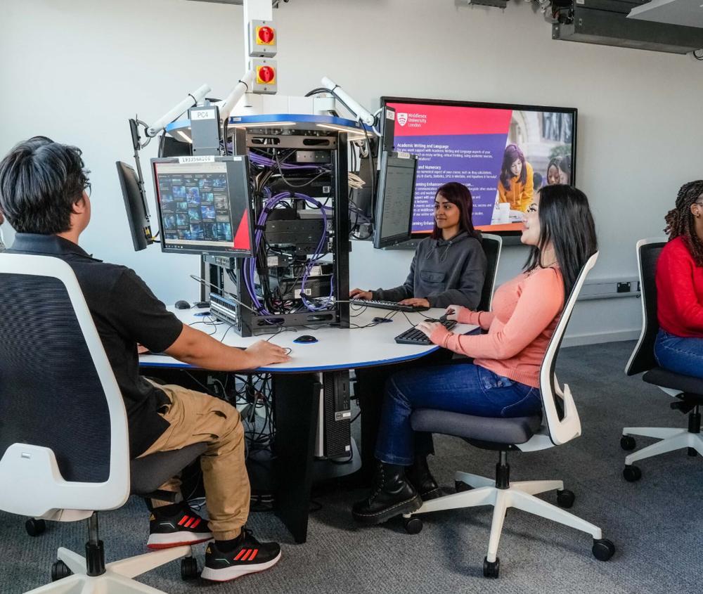A group of computer science students working in the computing lab