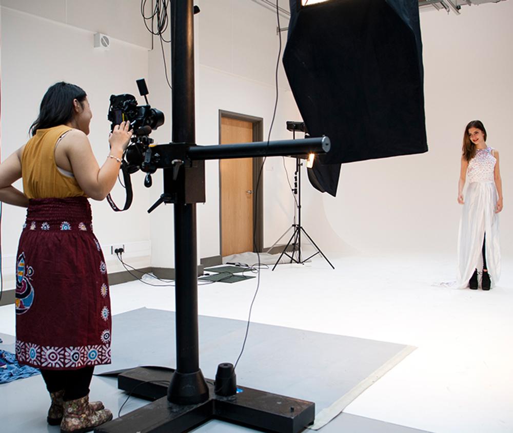 Photography-Studios where a student is taking a picture of another student