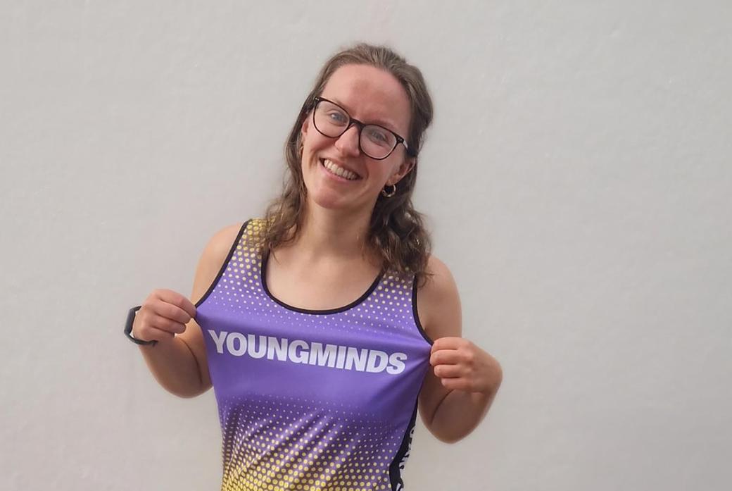 Amy Pritchard wearing youngminds running vest.