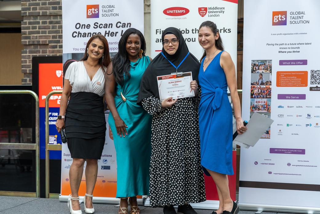 Competition winners standing together