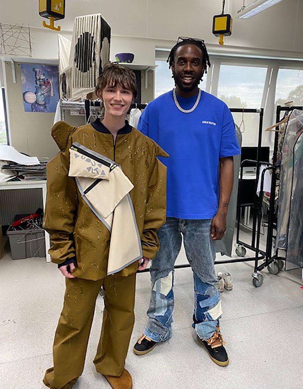 BA Fashion student Sosa Nnanna with a design from his waterproof menswear collection