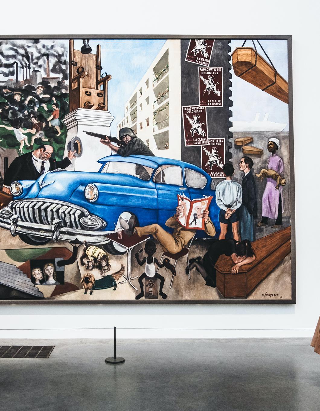 Visitors observing a car painting in an art gallery.