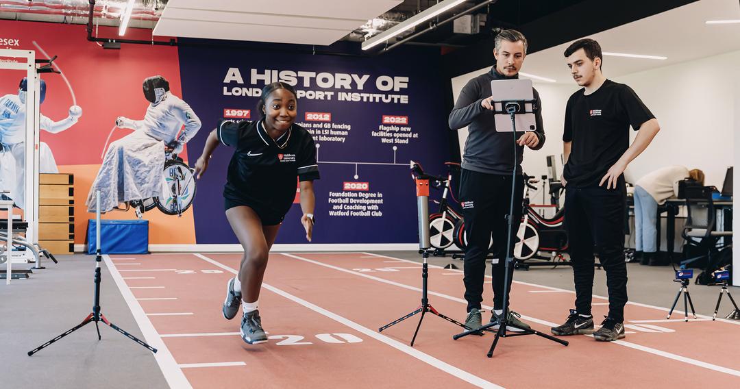 Student training on indoor track