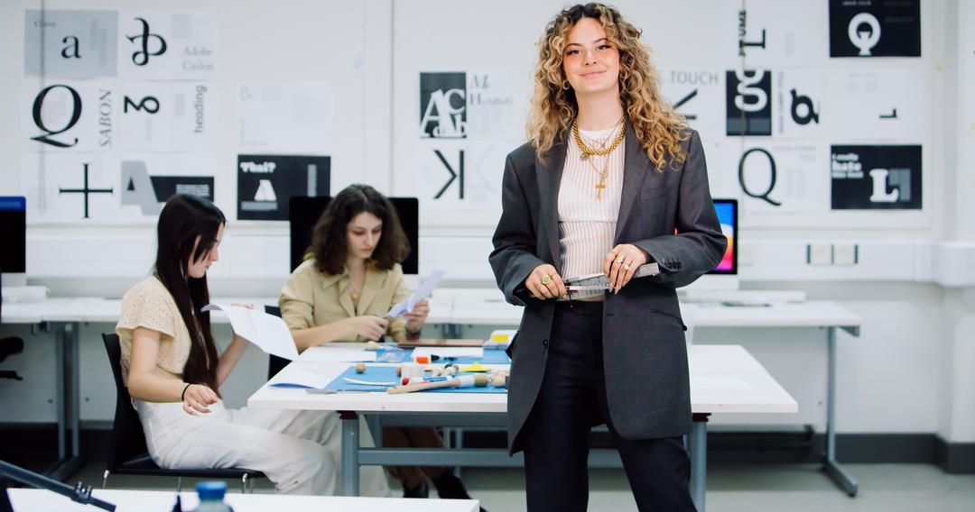 Students in a graphics studio working