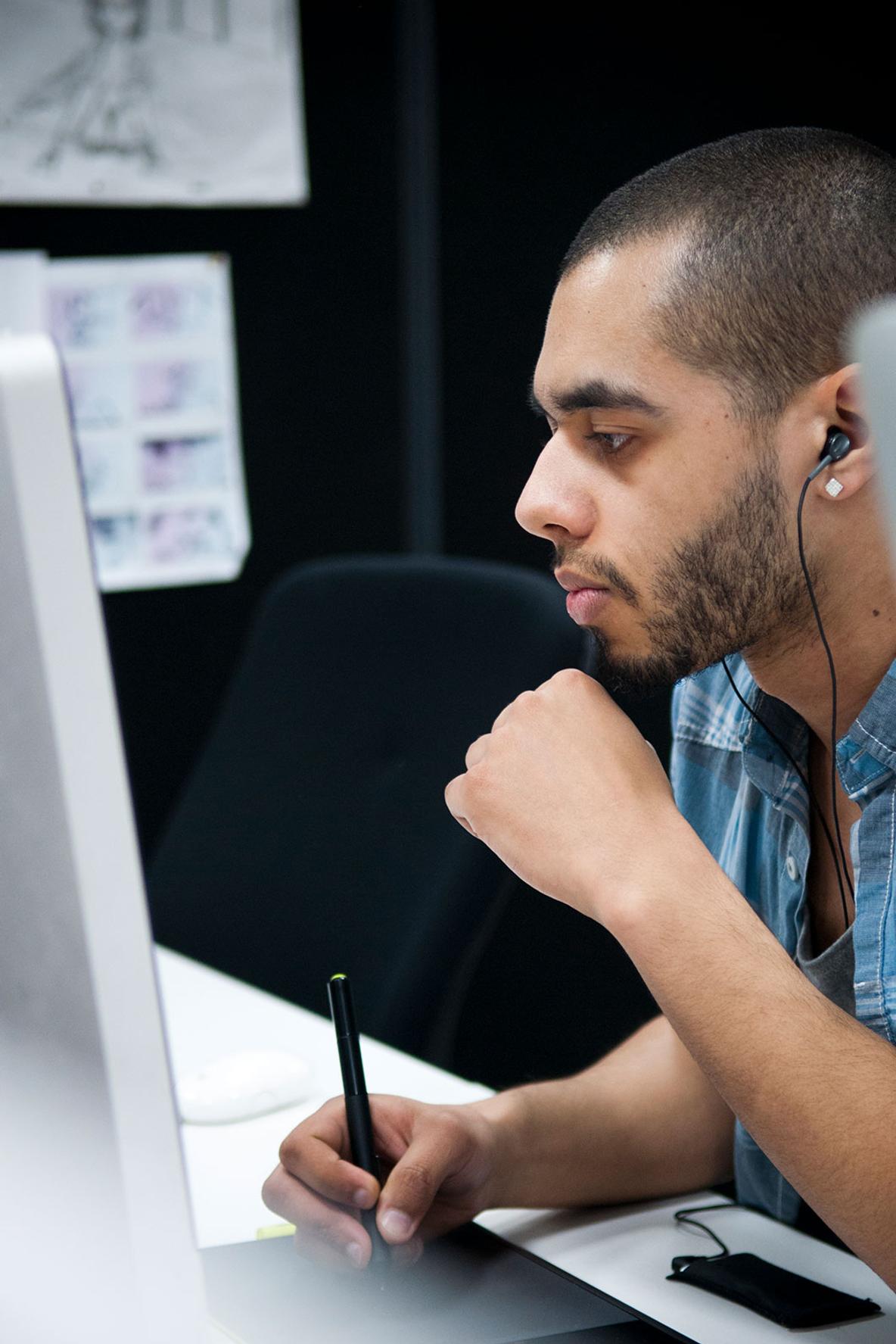 Animation student working at computer.