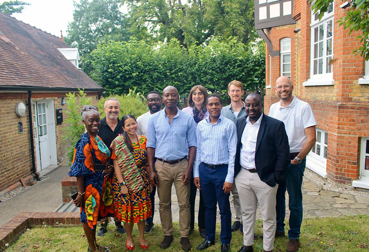 People stand outside building