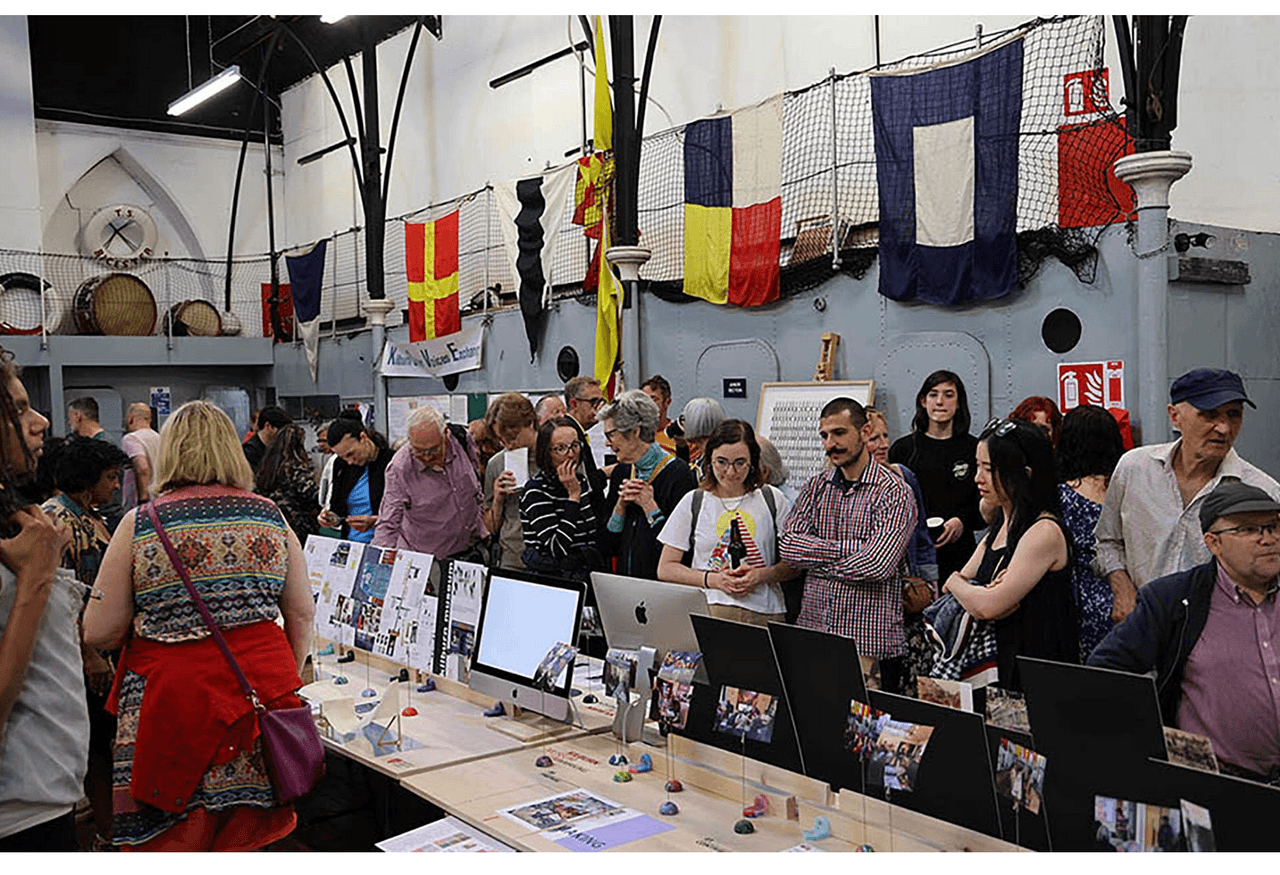 People admiring items exhibited