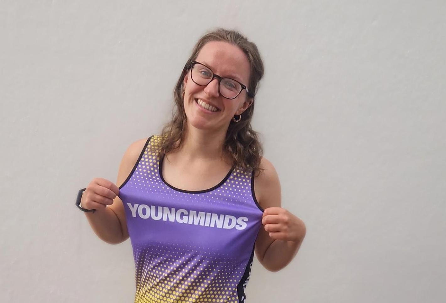 Amy Pritchard wearing youngminds running vest.