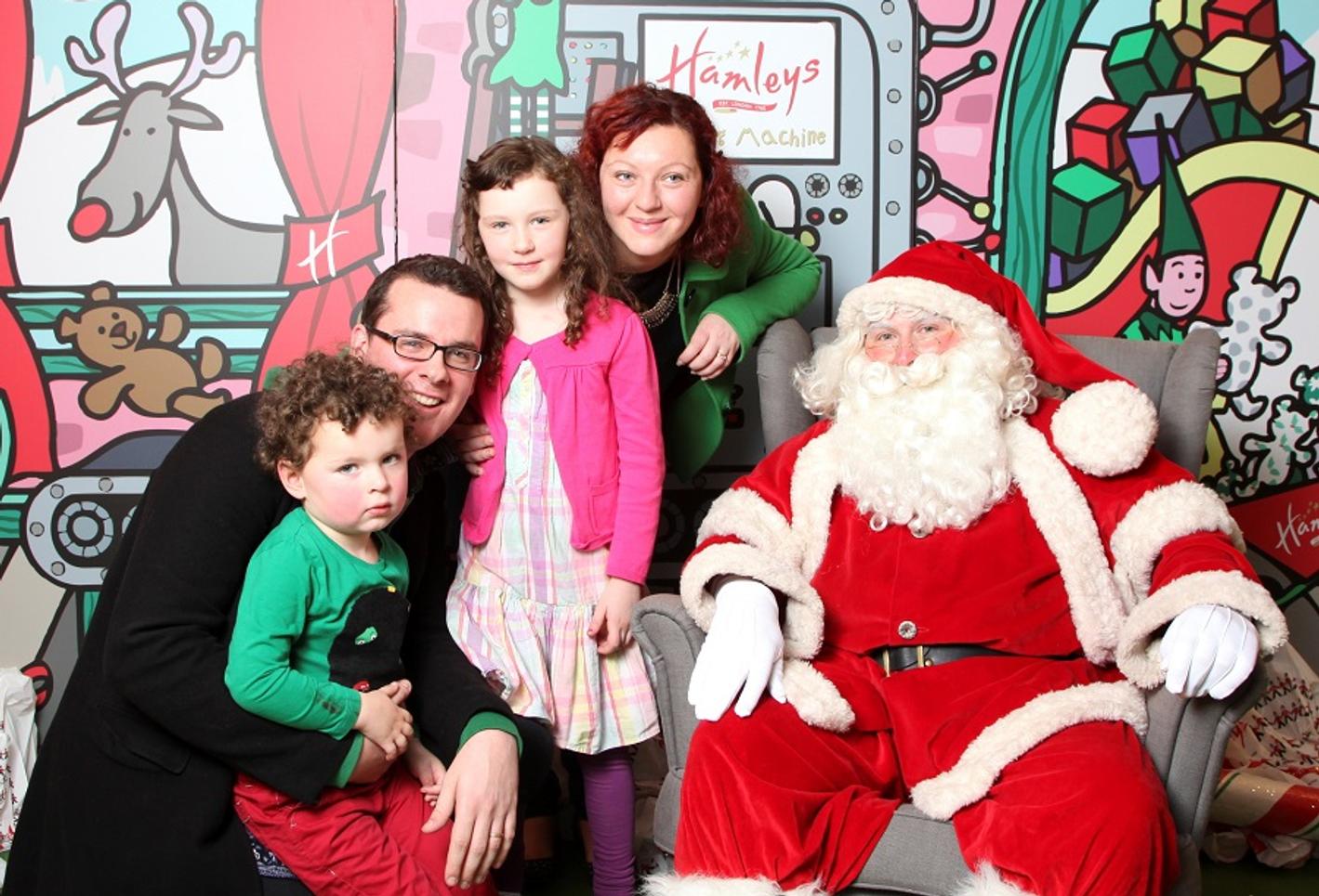 Mia family picture with Santa Claus