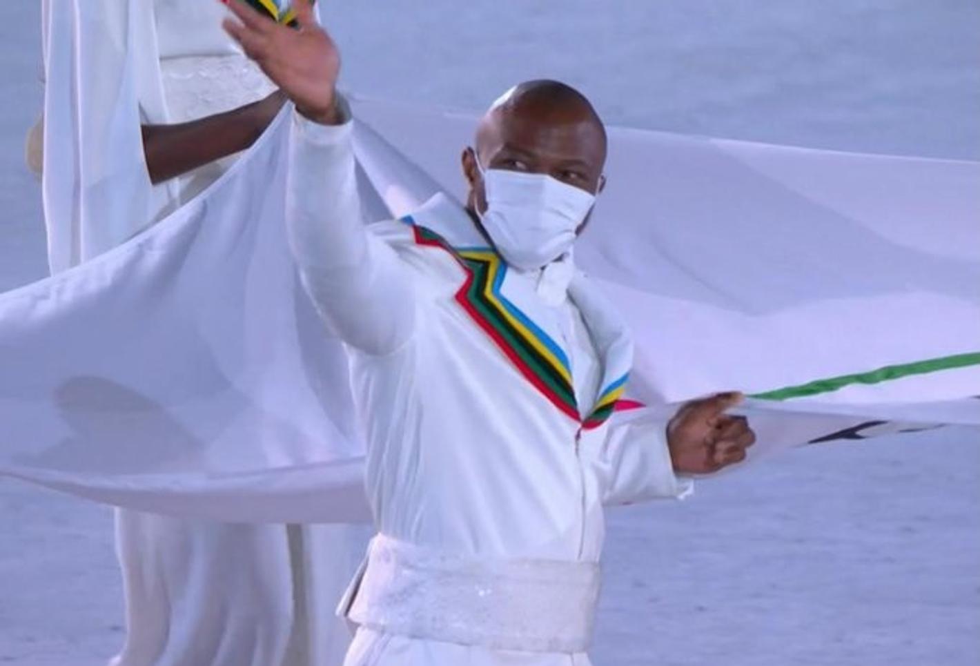 Cyrille with his national flag during the olympics