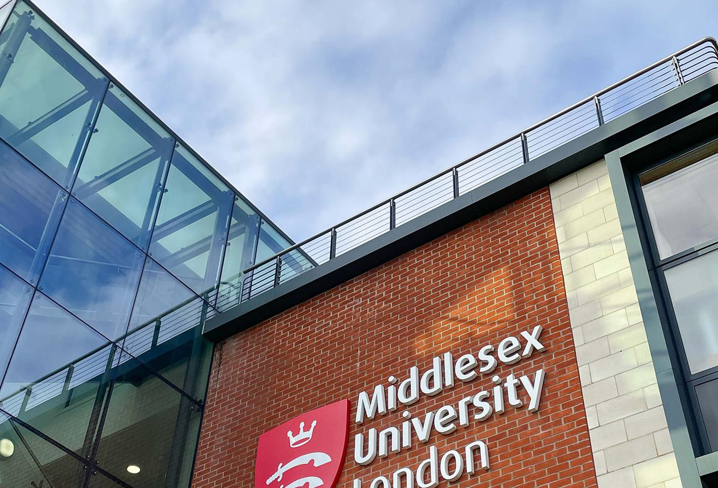 Middlesex logo on brick and glass building