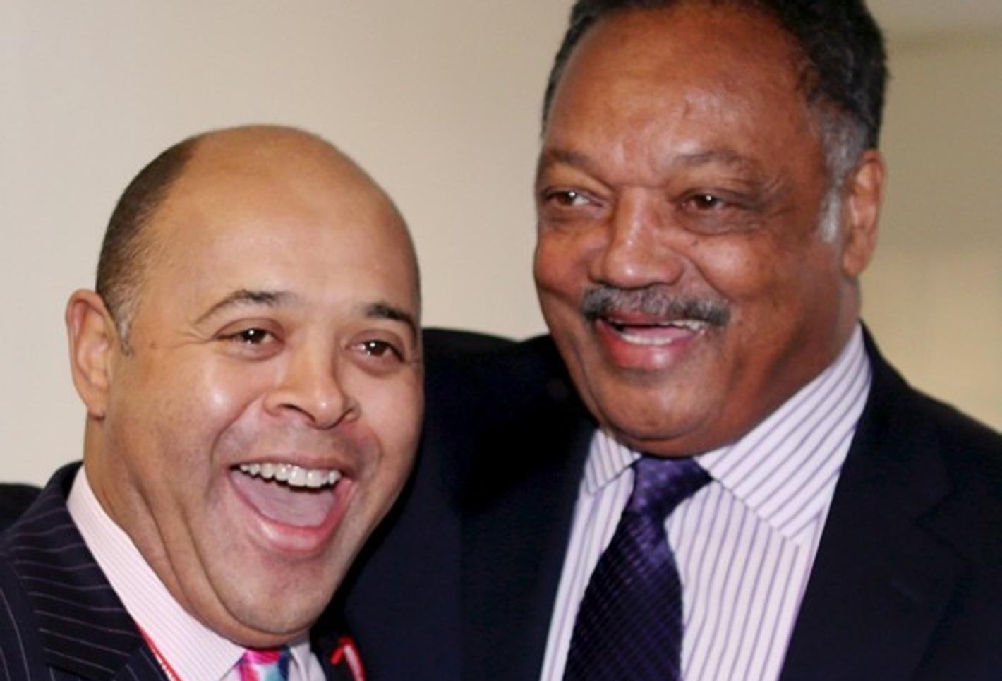 Jesse Jackson and Kurt Barling laughing together