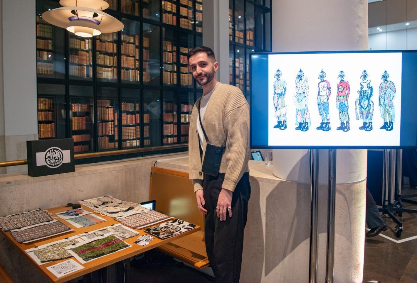 A male observing mihai Eugen Exhibition