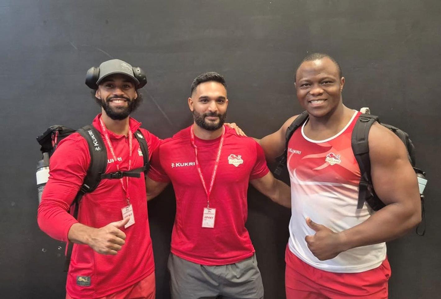 Weightlifters pose for a picture