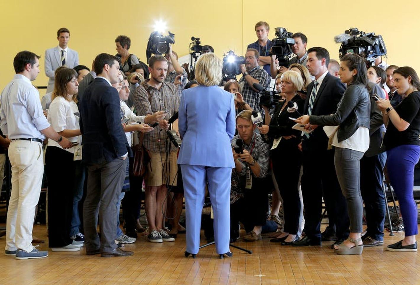 Journalists with Hillary Clinton