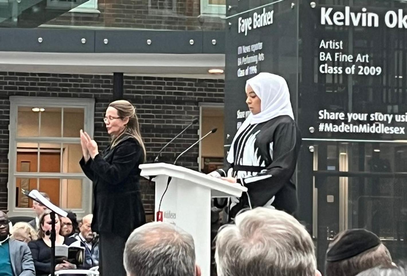 Presenters on stage for Holocaust event