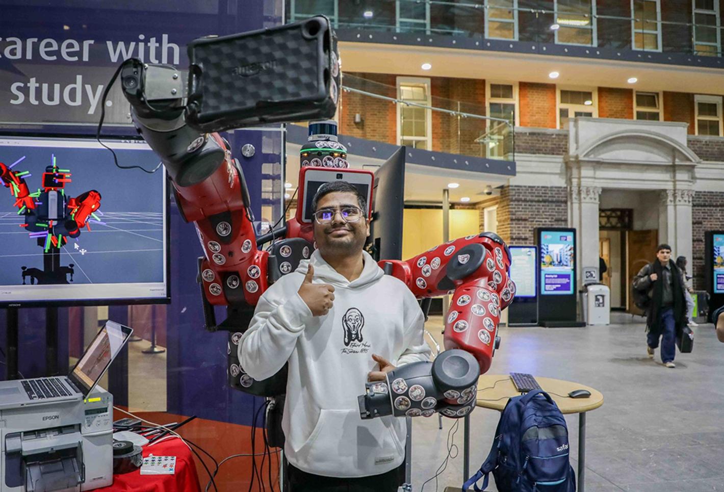 Student with Bertie selfie robot at STEM festival
