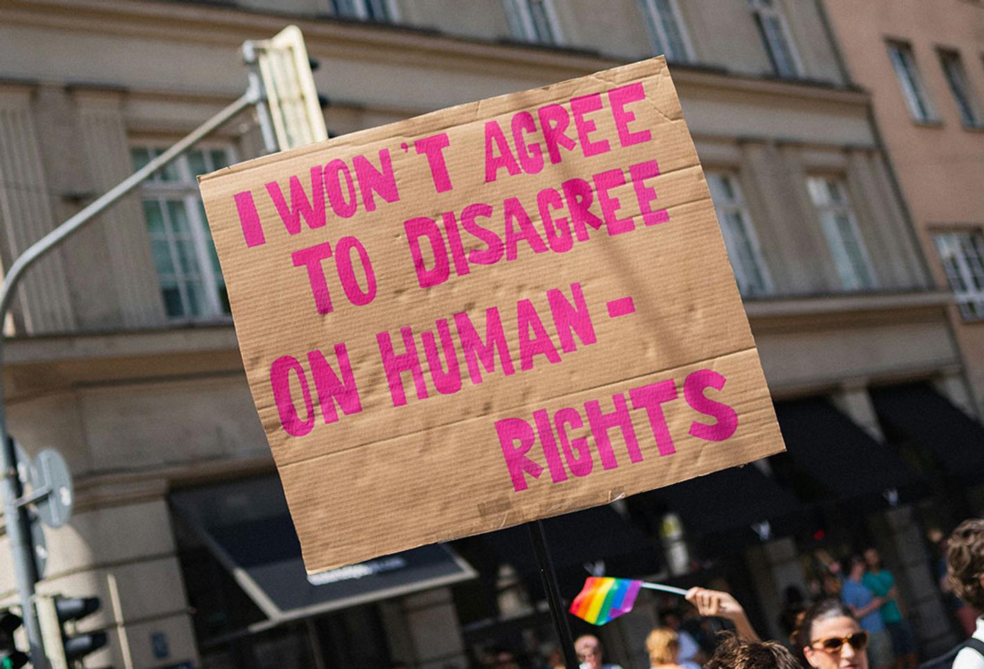 A sign with a message about human rights