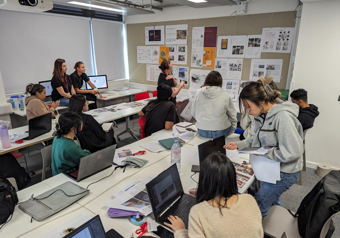 Students working together in a design studio