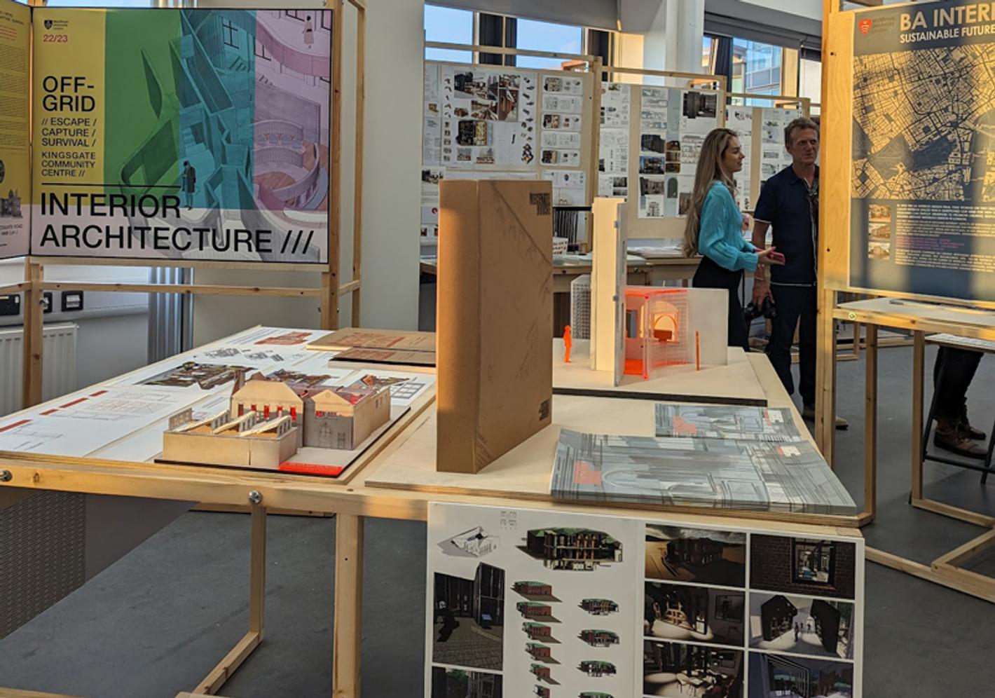Plans and models in an architecture exhibition