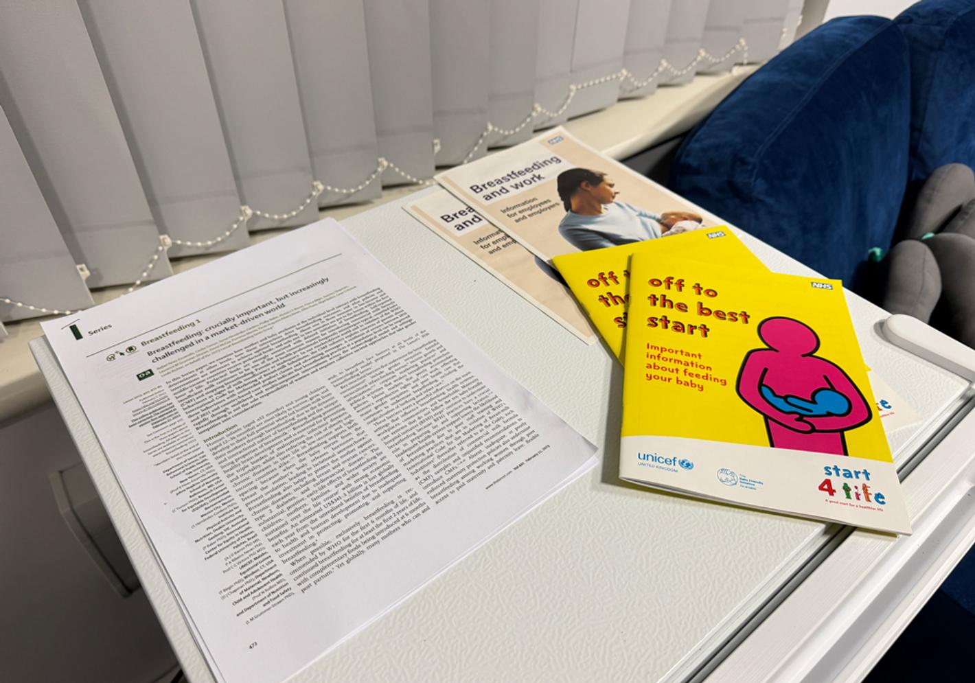 Printed notes and leaflets about the benefits of breastfeeding