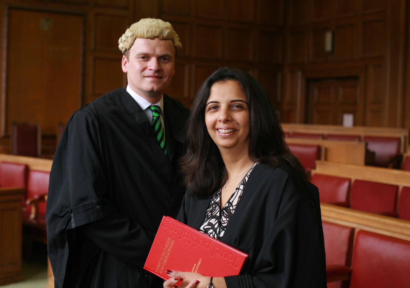 Two law students in law attire