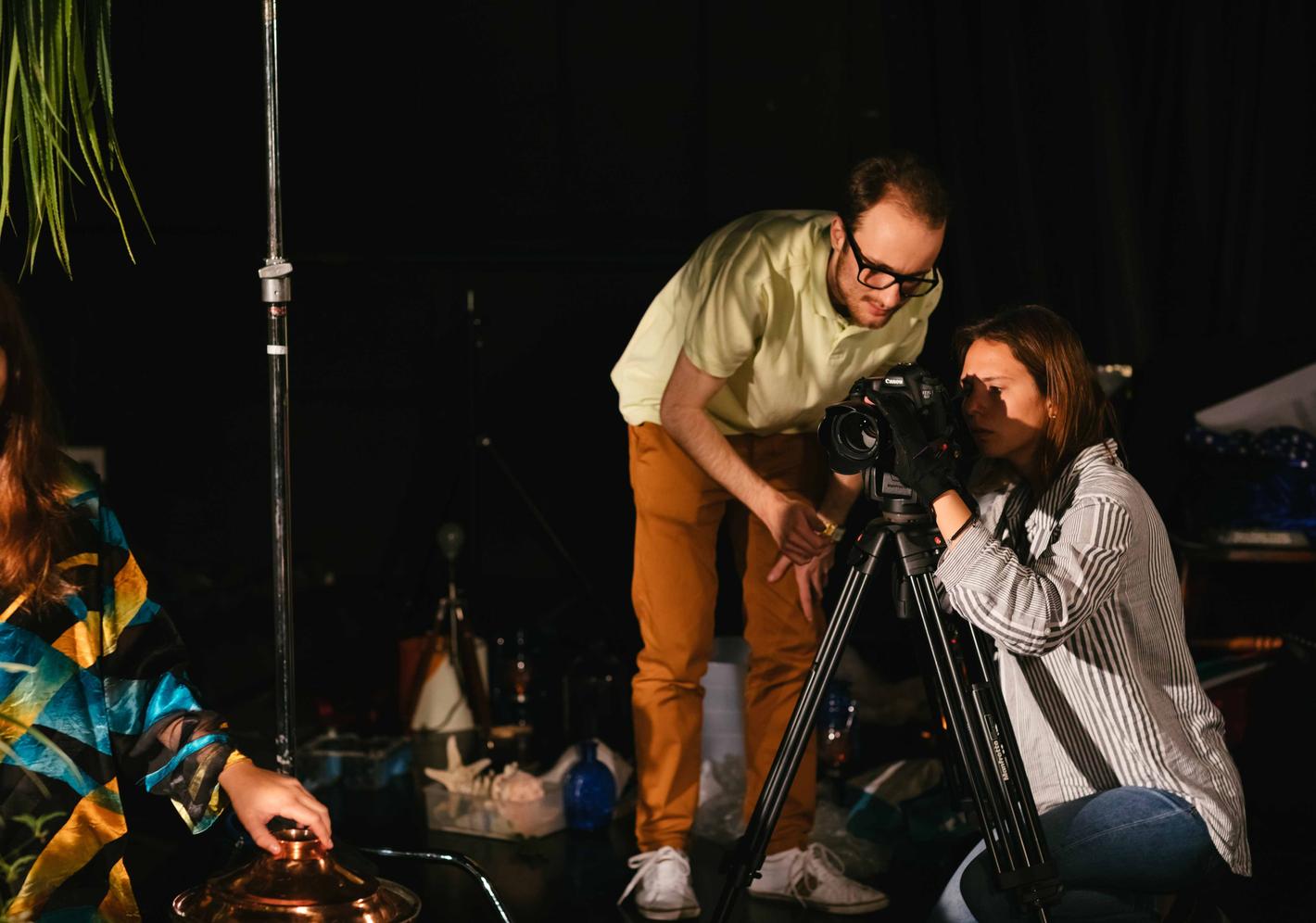 Two film students using a camera