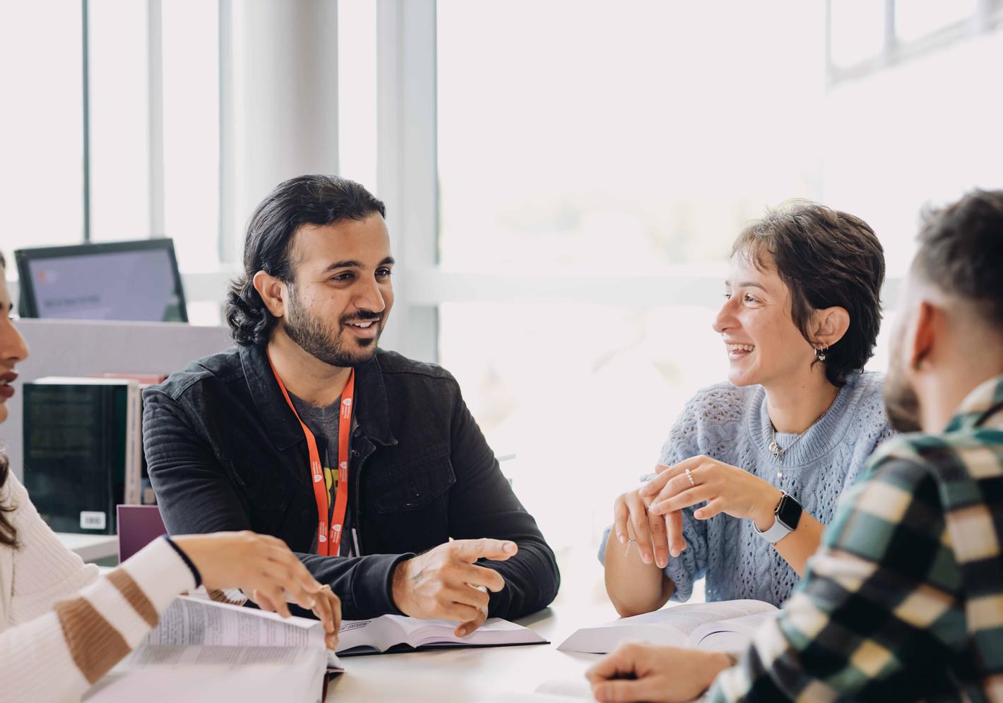 Students sat together having a discussion