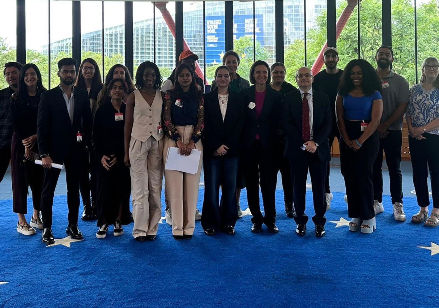 A group of students standing together on a visit to the European courts in Strasbourg