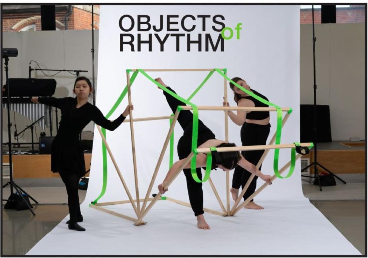 Two students create a display to be used in a dance show.
