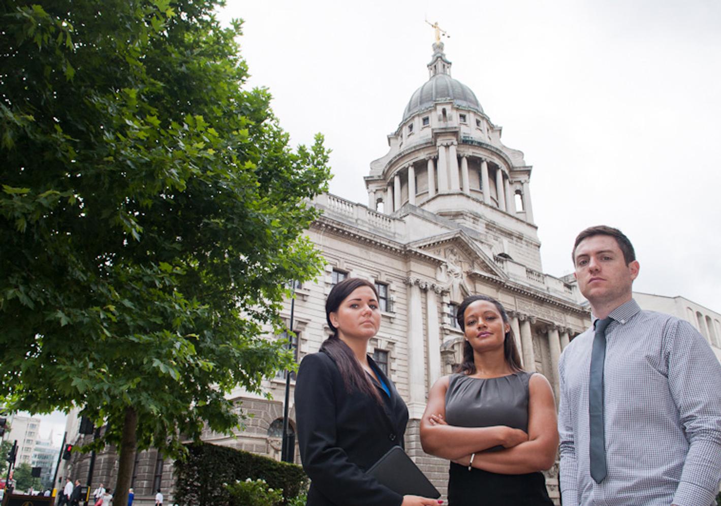 Three law students outside the Royal Courts of Justice