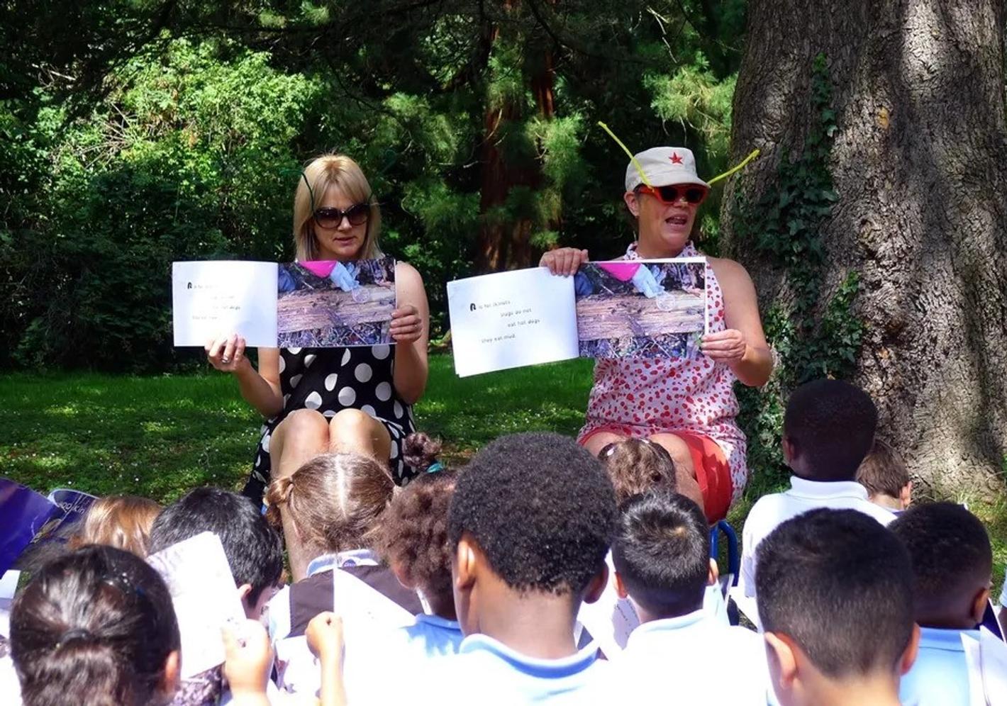 Educators surrounded by children