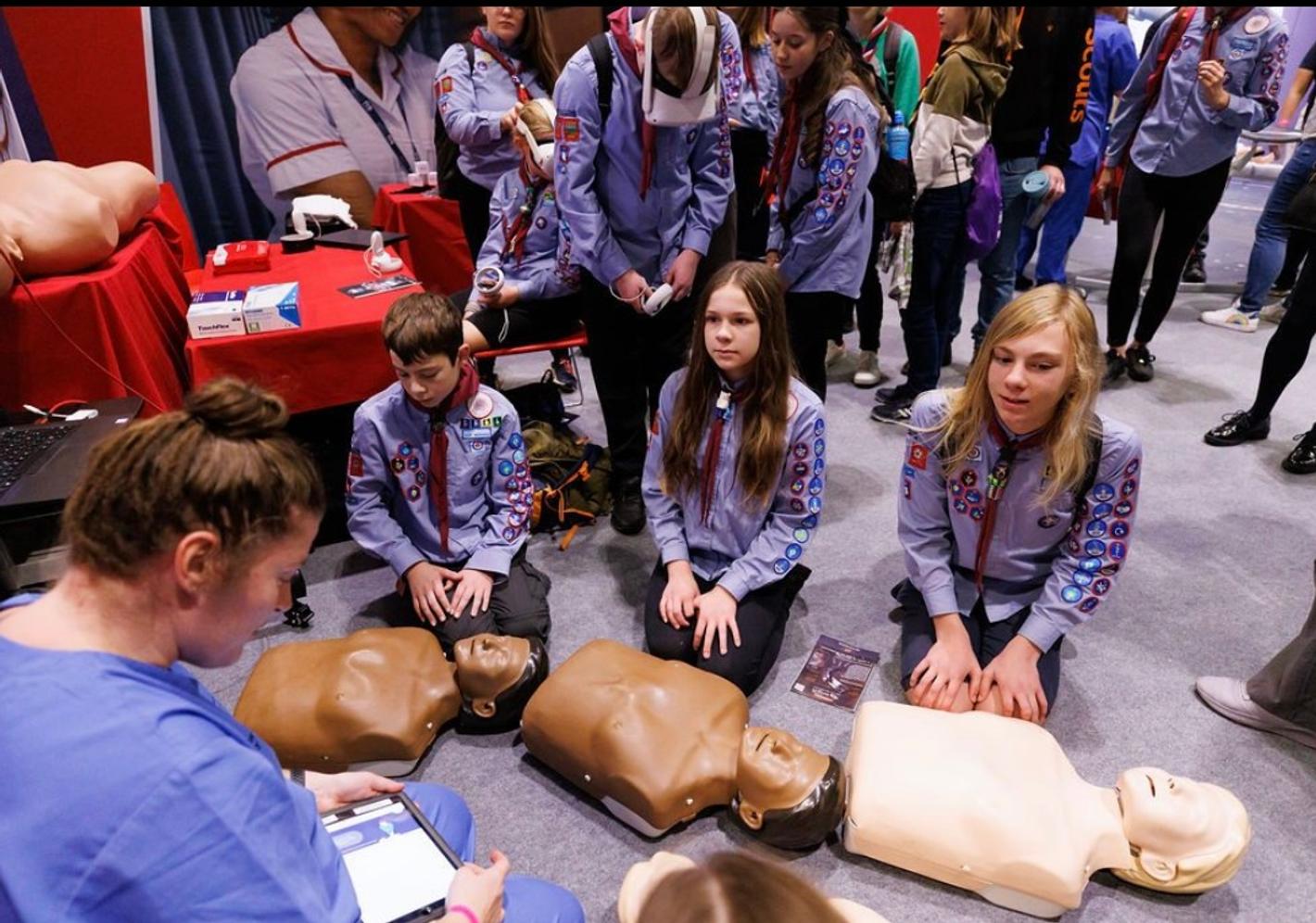 Students learning CPR at New Scientist event