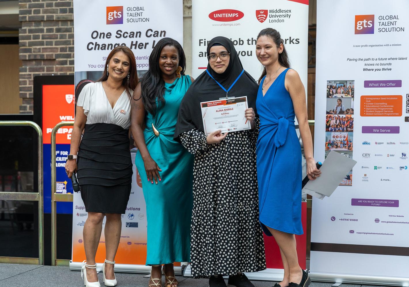 Competition winners standing together