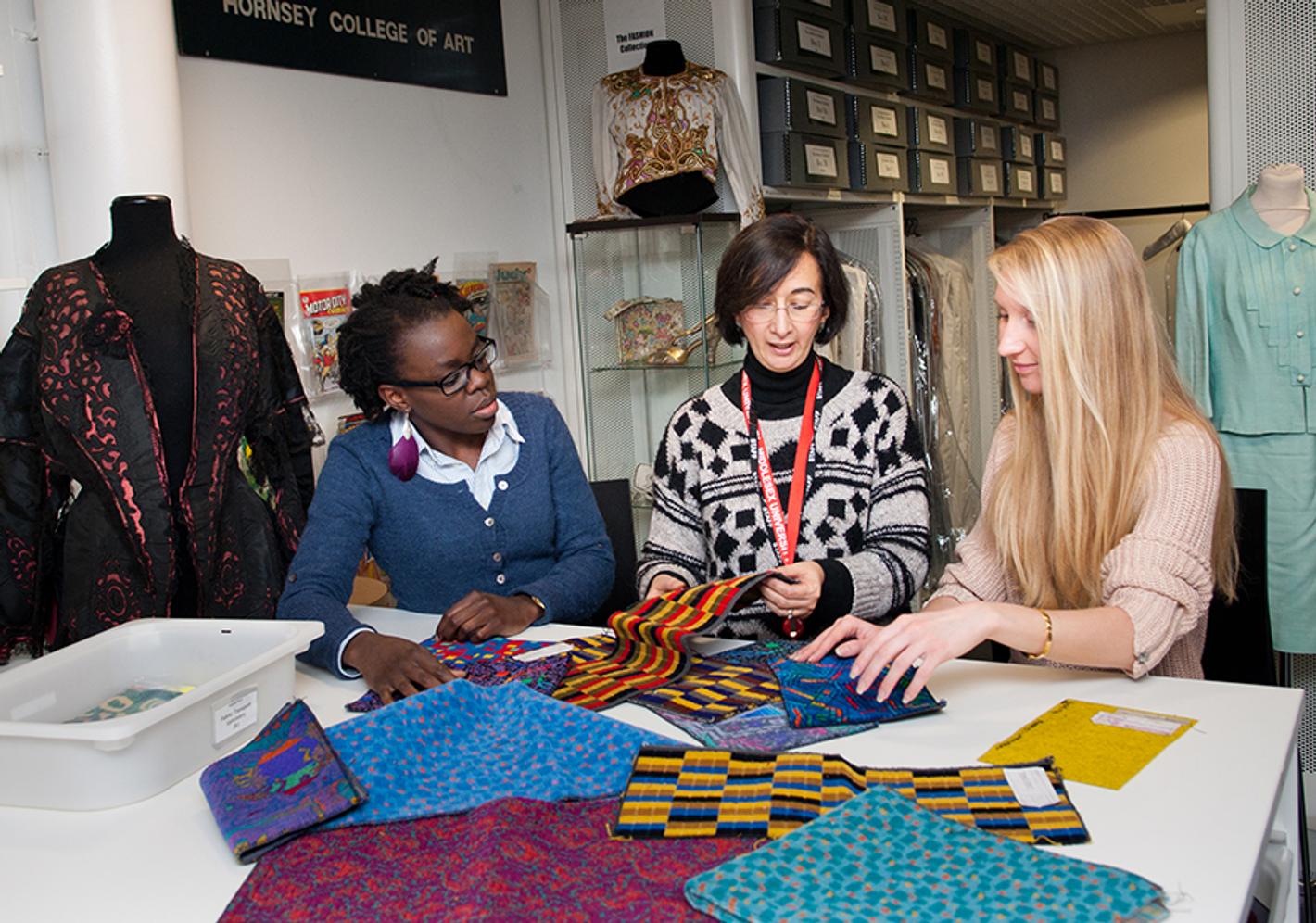 Women looking at materials