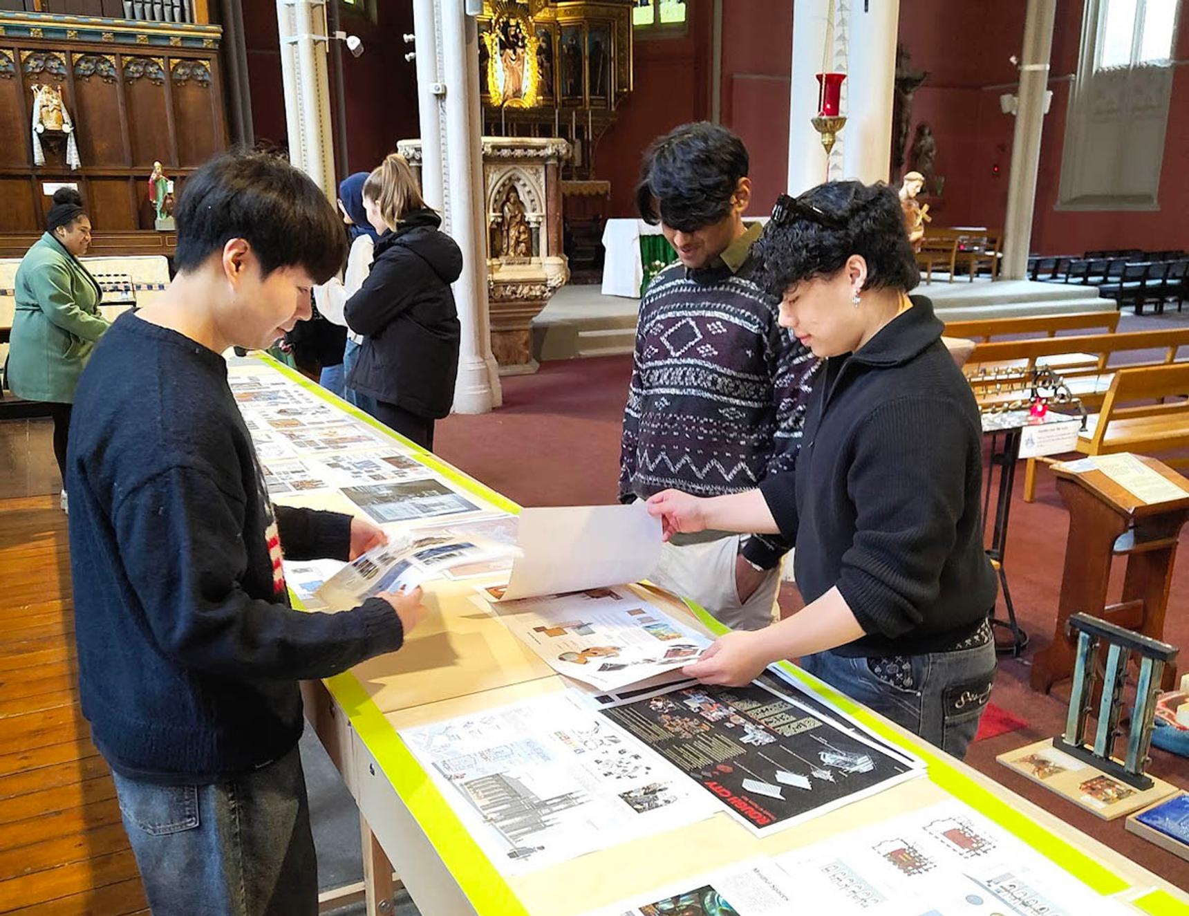 Students working on designs