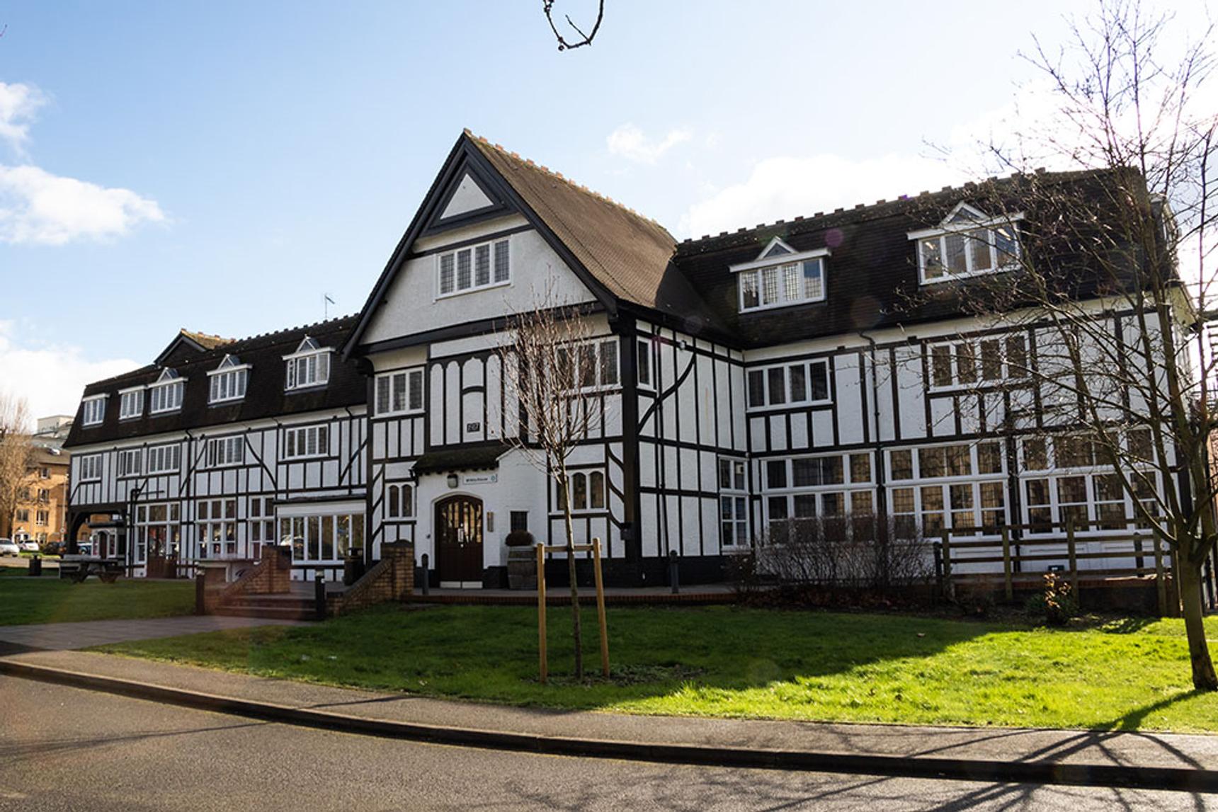 old white building with timbers
