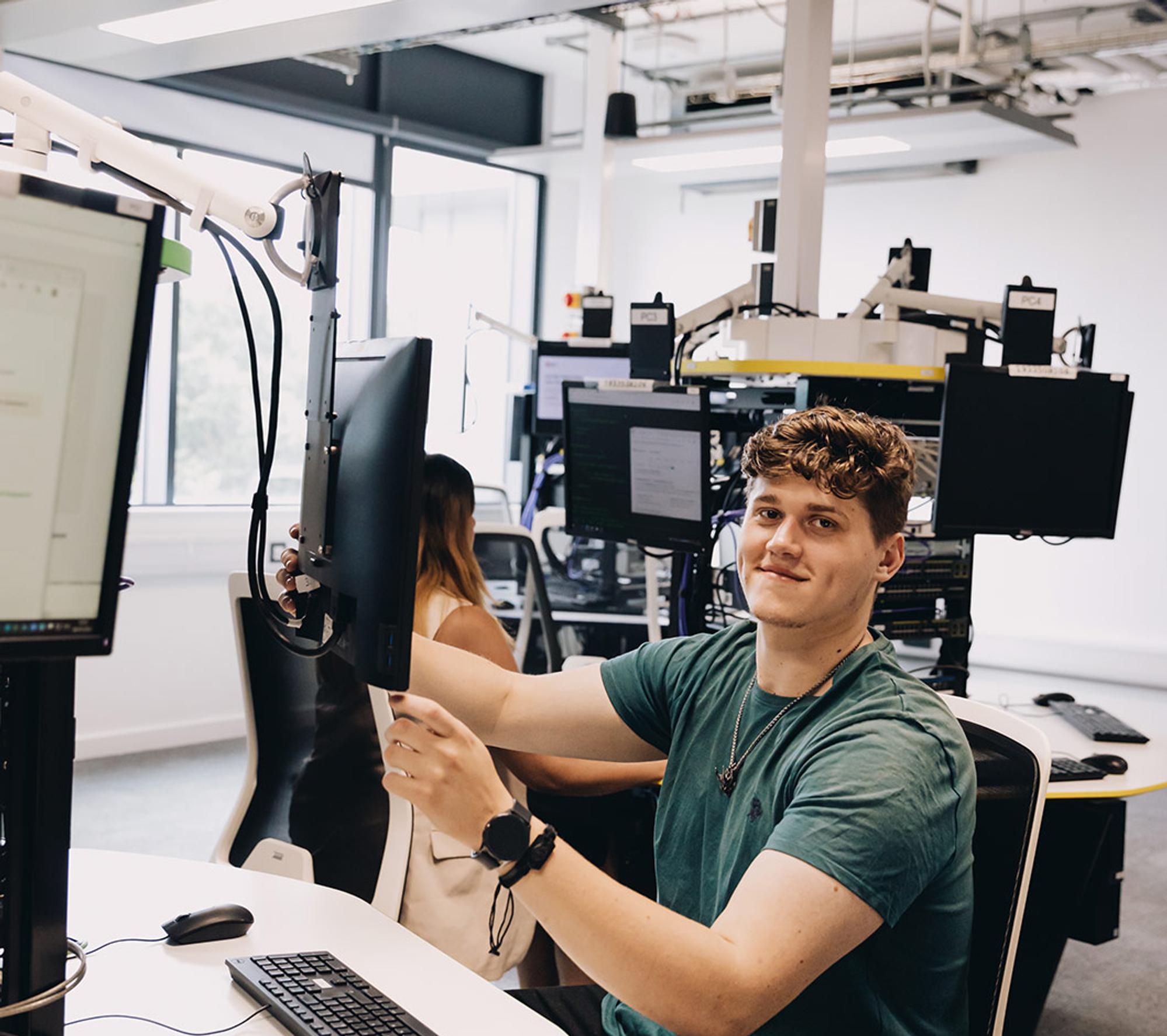 Male student using IT lab