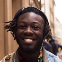 Person smiling in a street