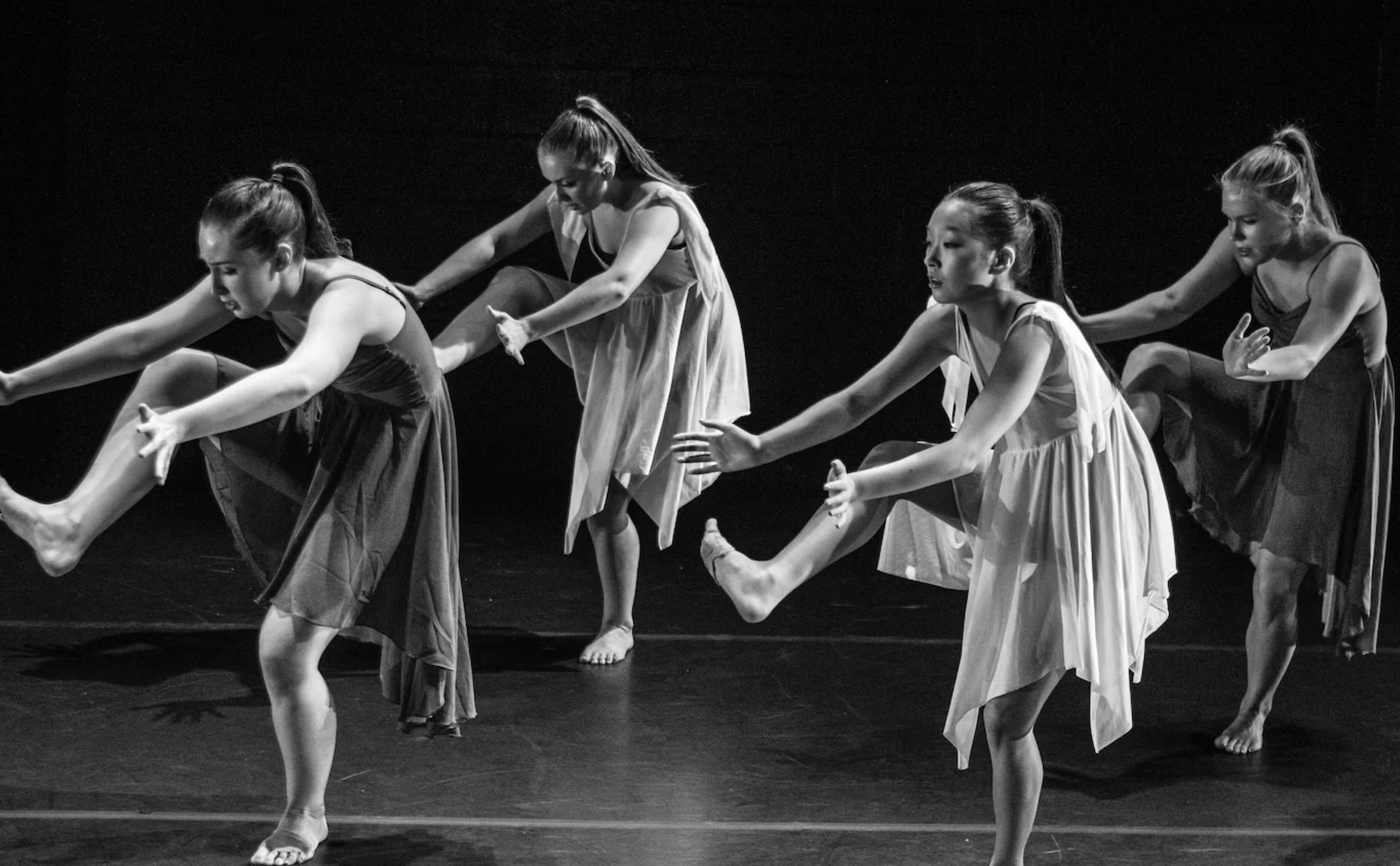 Dancing performers on stage
