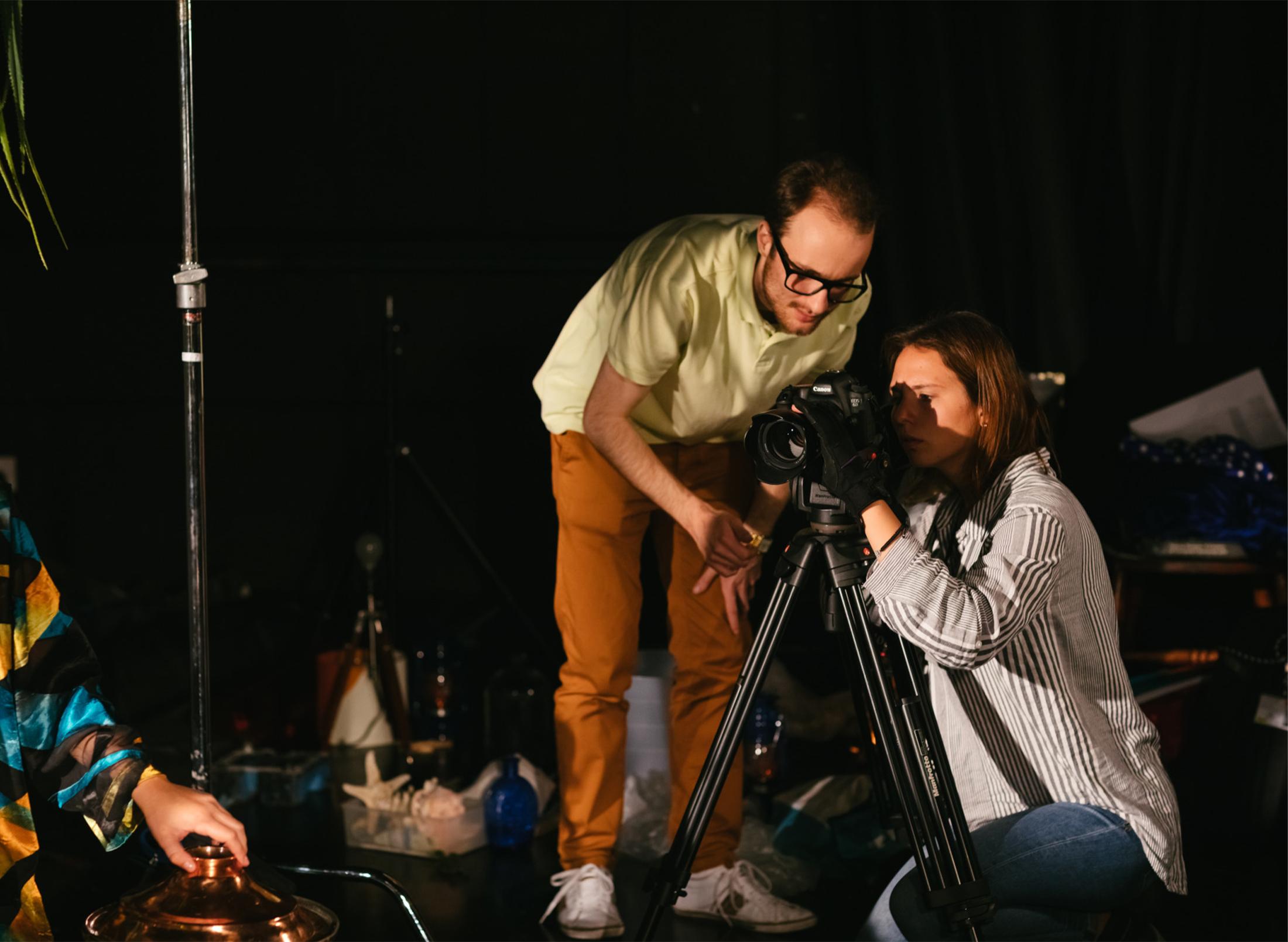 Students behind a camera