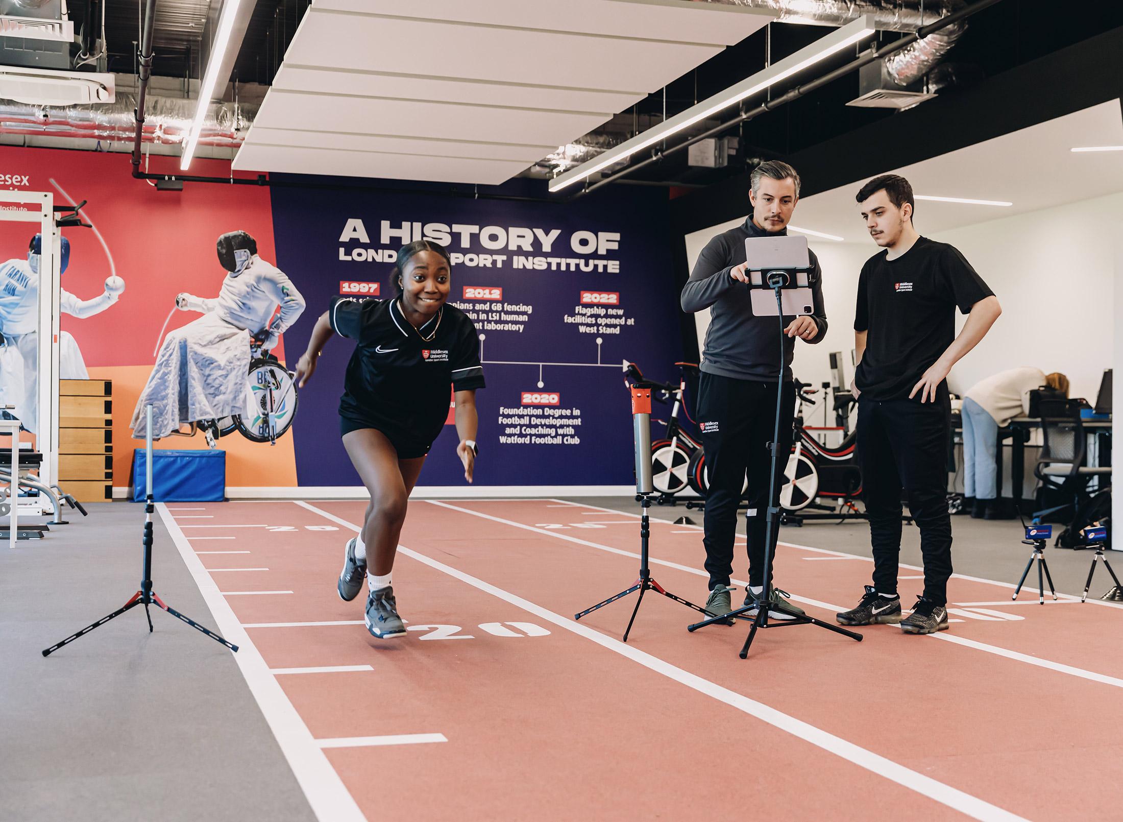 Student training on indoor track