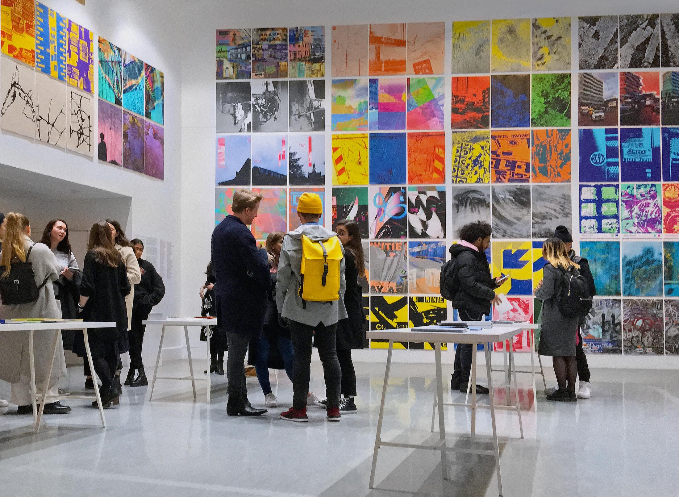 Students at an art exhibition