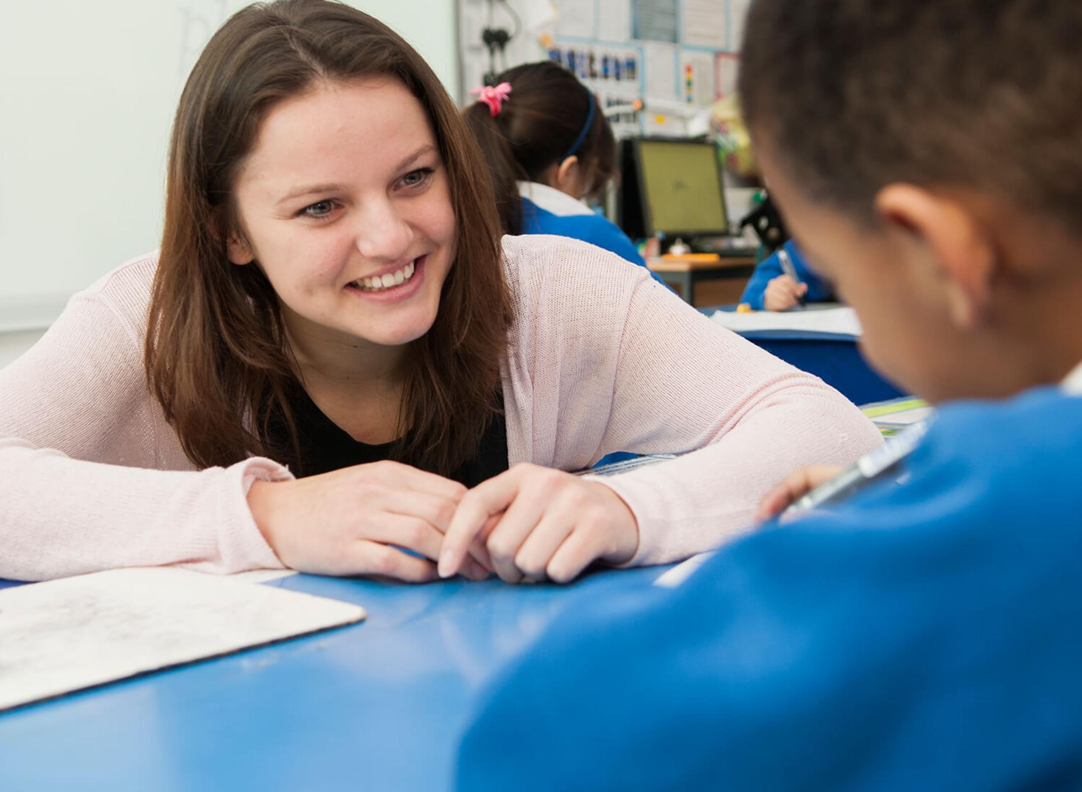 teacher student and child in school