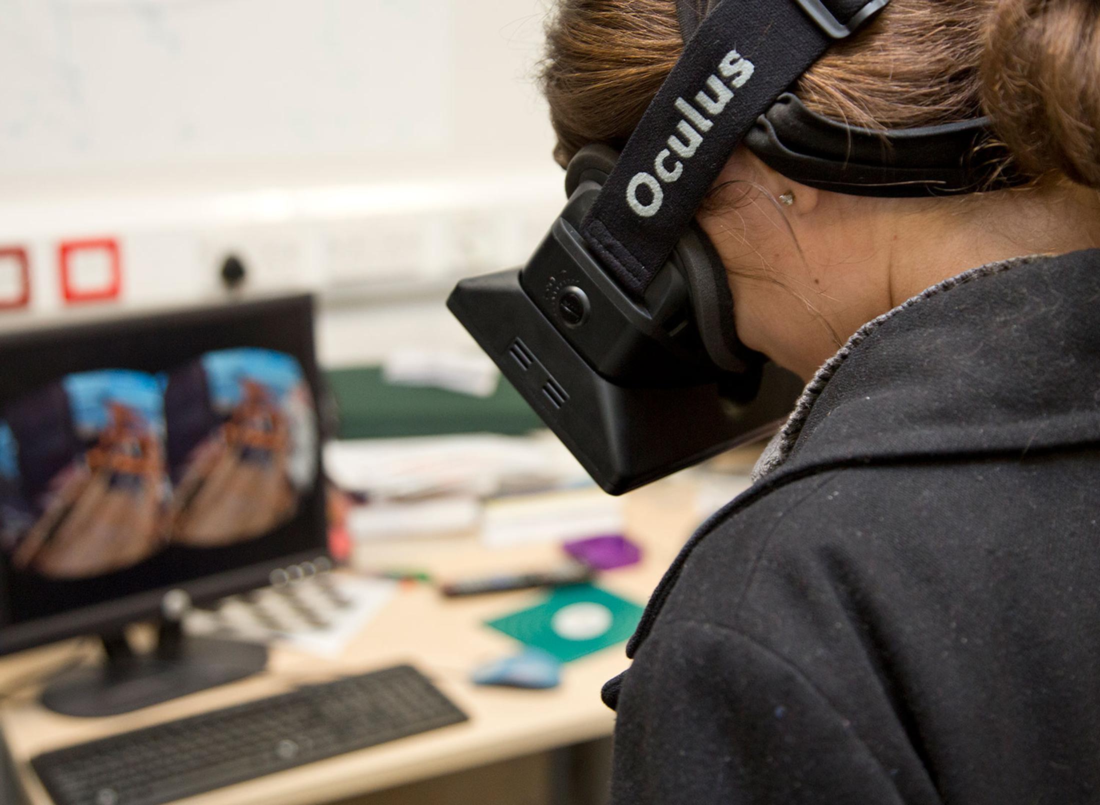 A student with a headset on