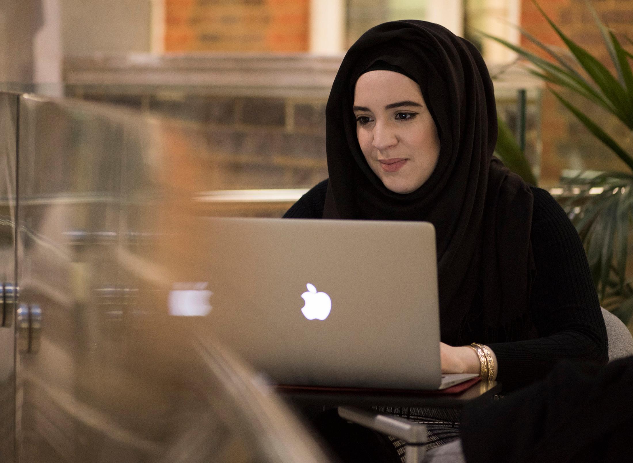student working on laptop