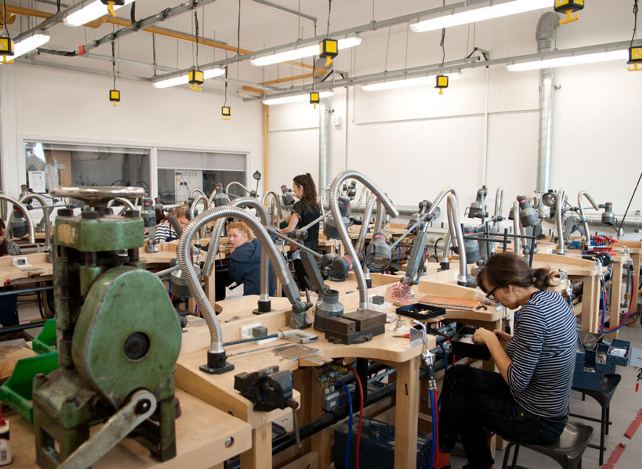 Arts and creative student in wood workshop