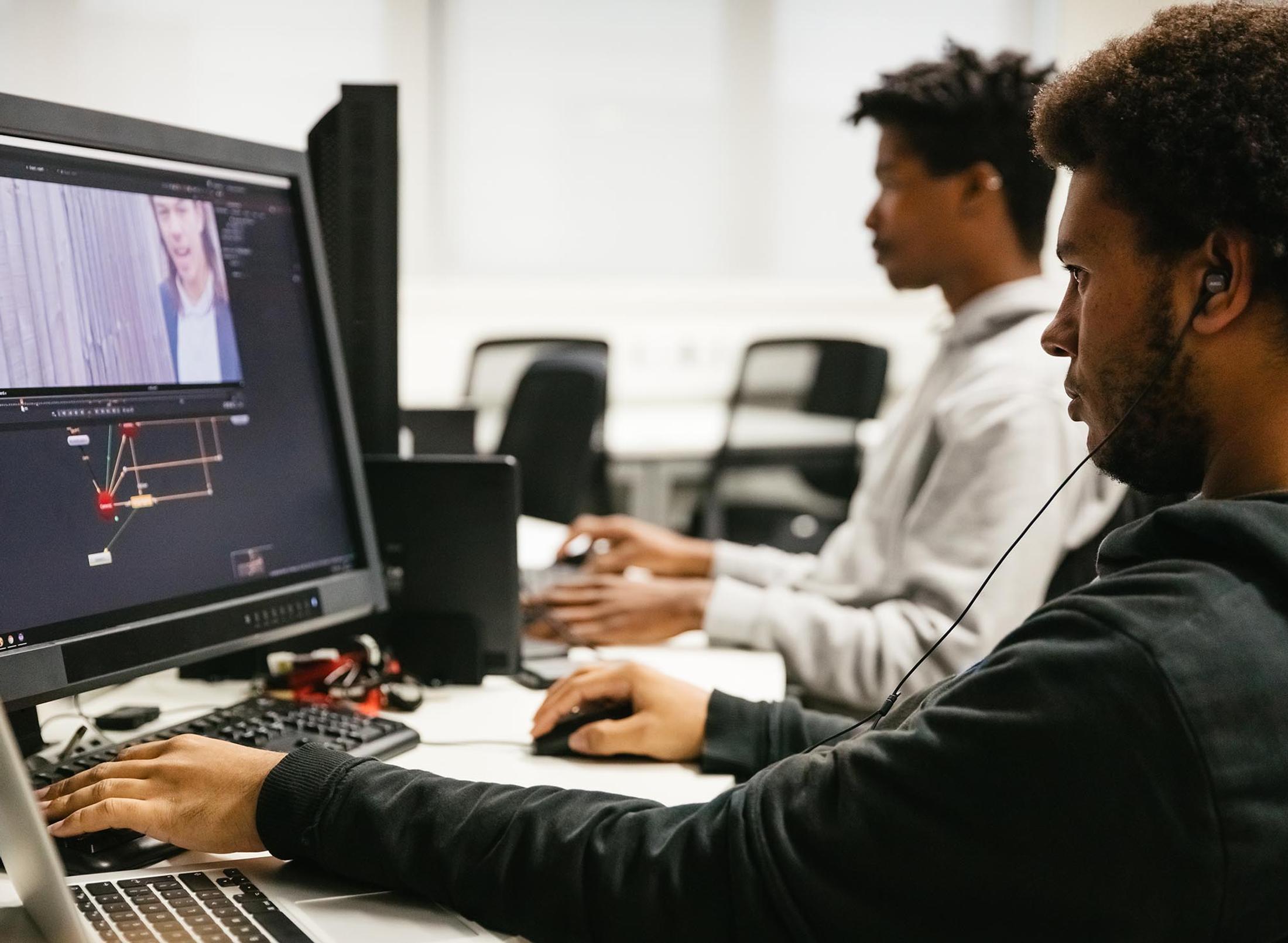 Student working on designing a game