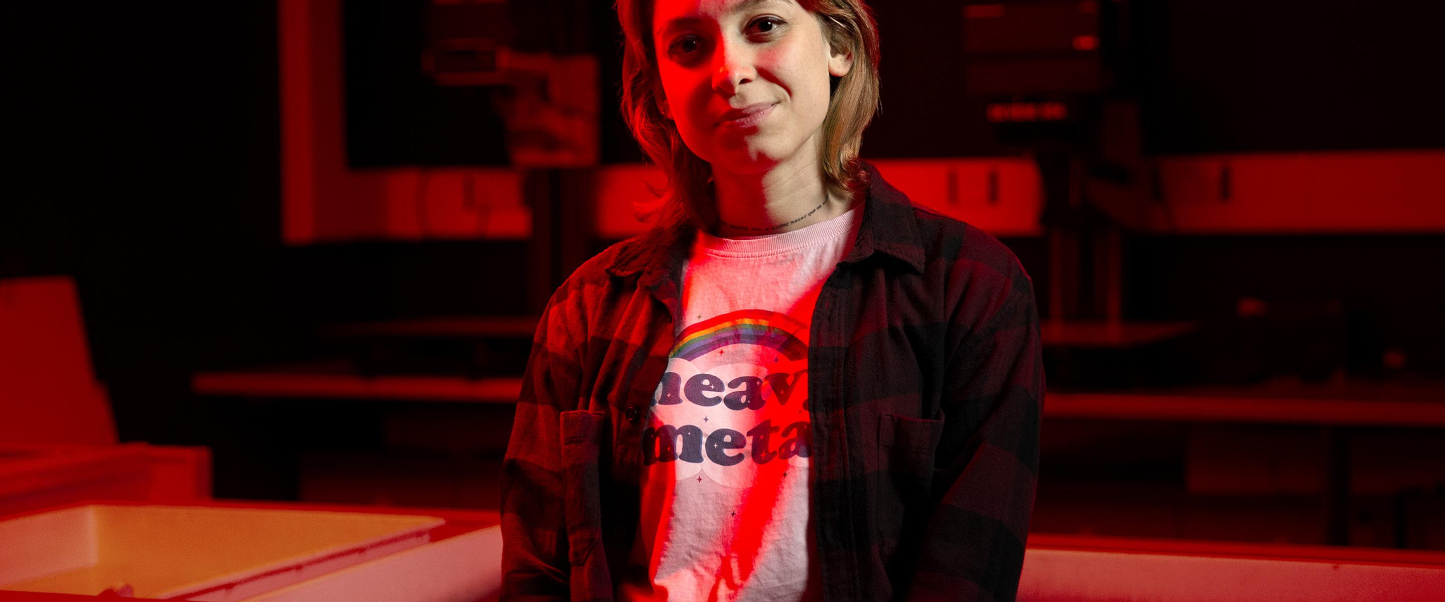 Female student in photography dark room